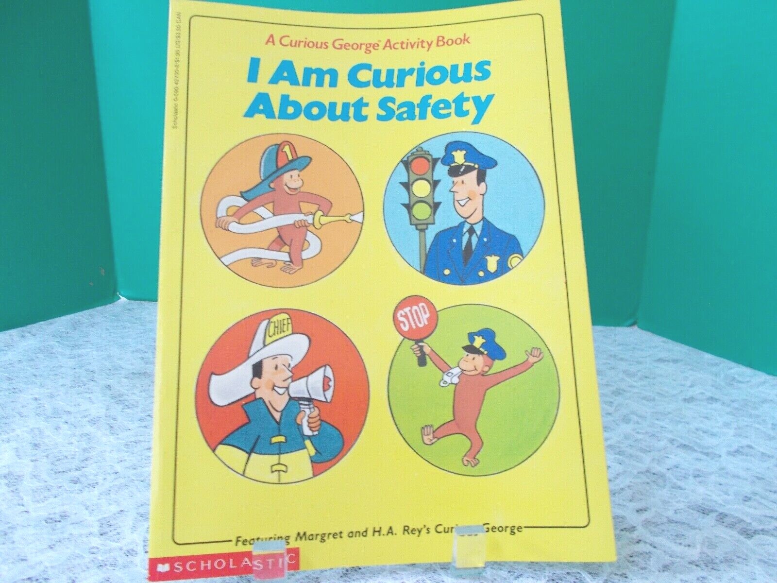 1987 Scholastic Curious George Activity Book- «I Am Curious About Safety»