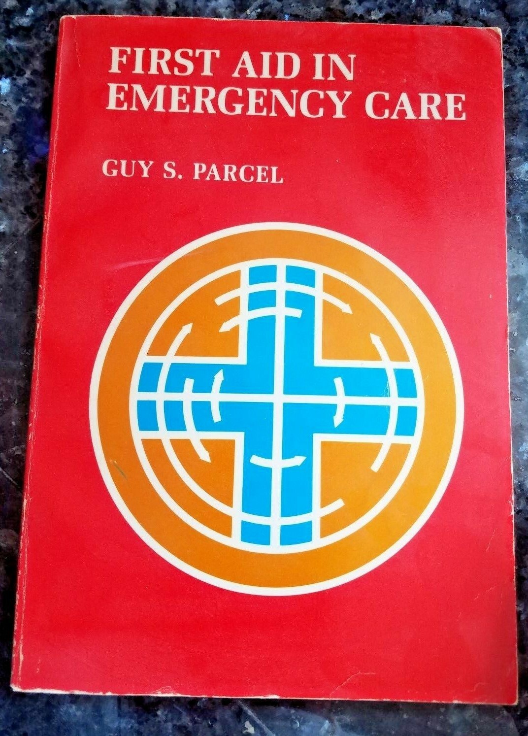 FIRST AID IN EMERGENCY CARE by GUY S. PARCEL 1977 SOFT COVER MOSBY USA BOOK
