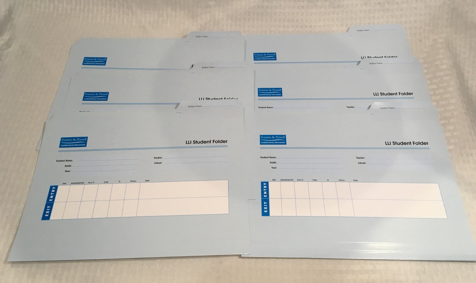 LOT OF 6 FOUNTAS & PINNELL LEVELED LITERACY INTERVENTION SUDENT FOLDER / BLUE