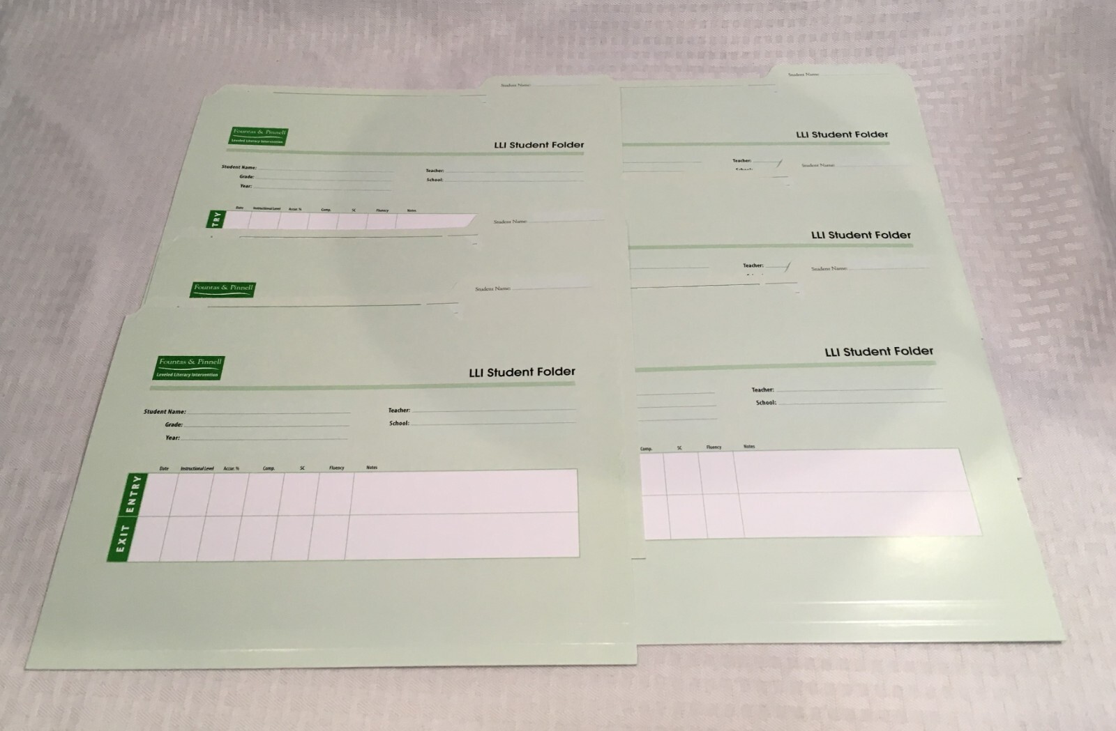 LOT OF 6 FOUNTAS & PINNELL LEVELED LITERACY INTERVENTION SUDENT FOLDER / GREEN