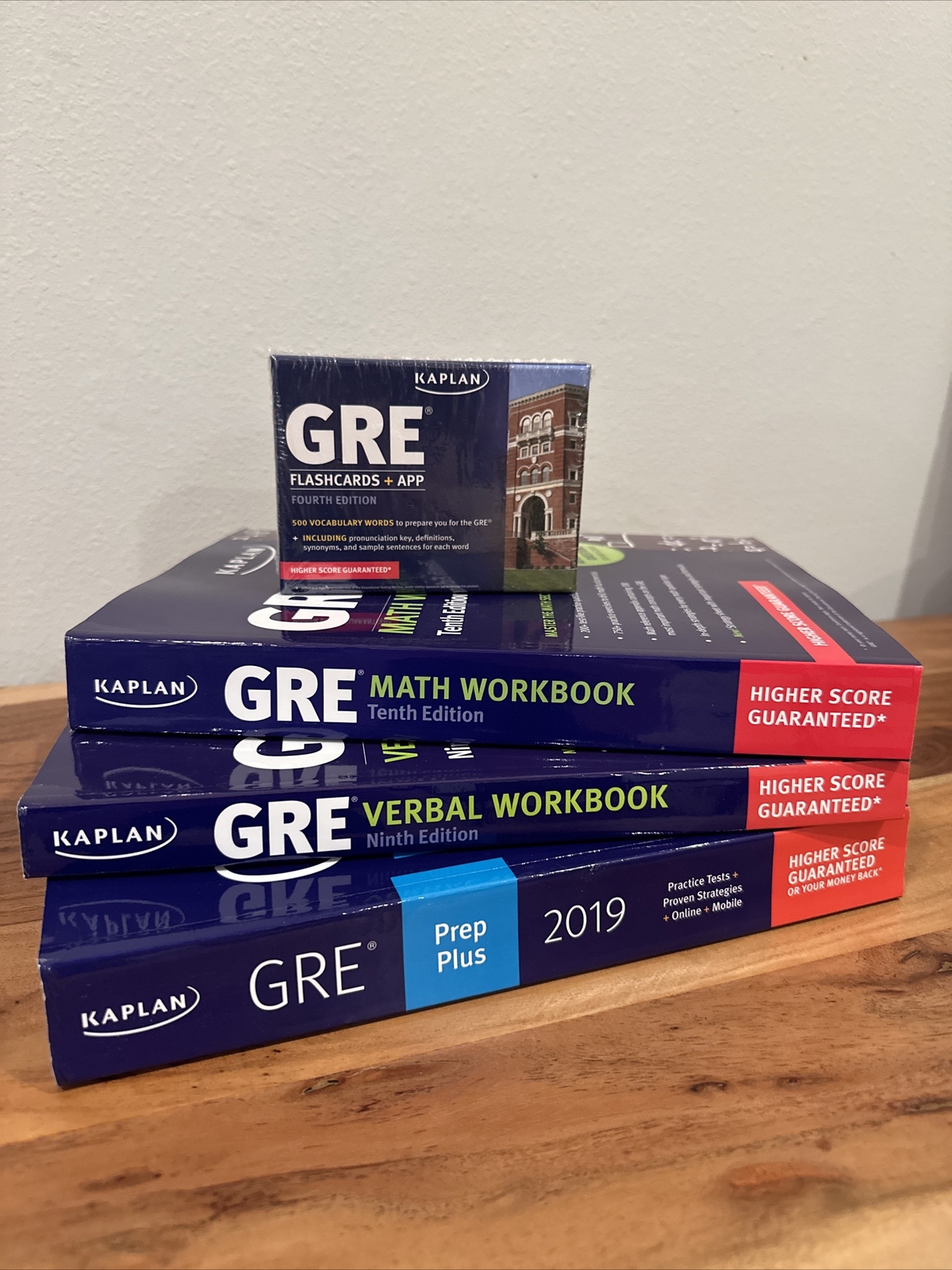 Kaplan GRE Prep Plus, Verbal Workbook, Math Workbook, Flashcards + App