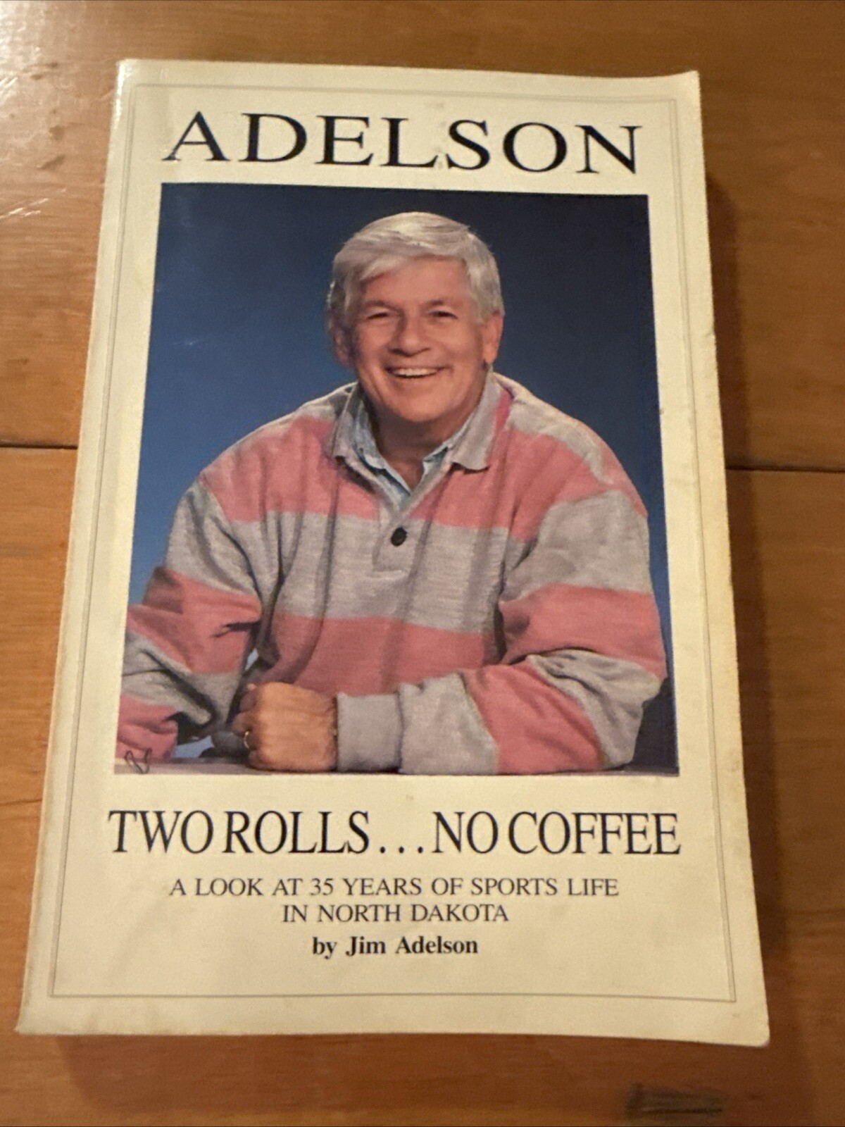 TWO ROLLS NO COFFEE: A LOOK AT 35 YEARS OF SPORTS LIFE North Dakota Jim Adelson