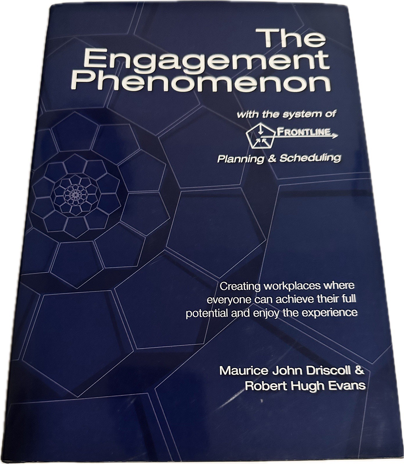 Business Book – The Engagement Phenomenon Hard Cover Book by Driscoll and Evans