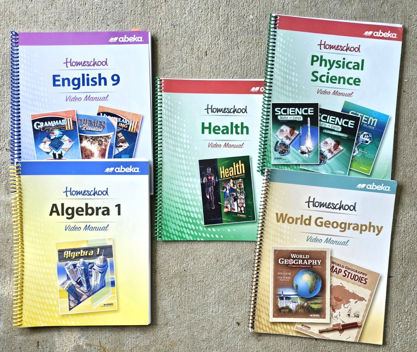LOT OF 5 ABEKA VIDEO MANUALS (HEALTH ENGLISH SCIENCE ALGEBRA-1 WORLD GEOGRAPHY)