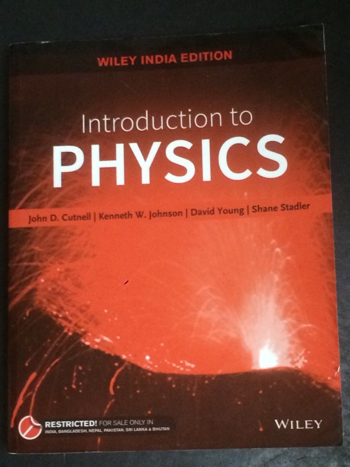 Introduction to Physics Paperback – 2016 by John D. Cutnell USED Wiley Books