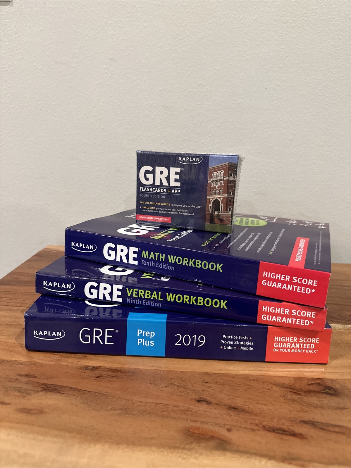 Kaplan GRE Prep Plus, Verbal Workbook, Math Workbook, Flashcards + App